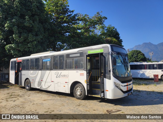 UniRio Transportes RJ 228.014 na cidade de Rio de Janeiro, Rio de Janeiro, Brasil, por Walace dos Santos. ID da foto: 11304720.